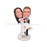 Customized bridegroom hold bride bobble head doll