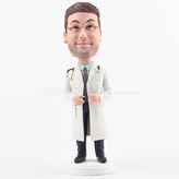 Kind doctor bobbleheads with white uniform