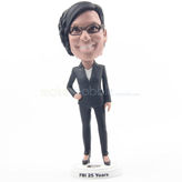 Teacher bebblehead with black glasses