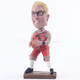 Basketball player bobblehead dolls