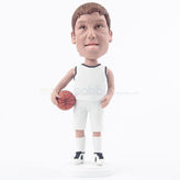 Dynamic man bobblehead with a basketball