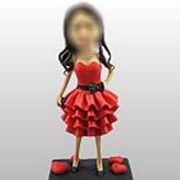 Red dress girl bobblehead doll