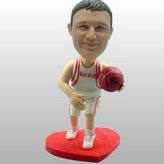 Basketball player bobble head doll