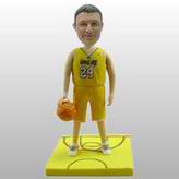 Basketball player bobble head doll