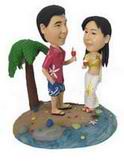 Couple bobblehead  in the coconut tree