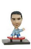 Skateboard player bobble head doll