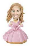 The party girl bobblehead with  a pink dress