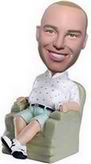 Man bobble head doll Watching TV