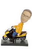 Man bobble head doll with motorcycle