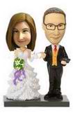 Wedding bobblehead with black tuxedo and white wedding dress