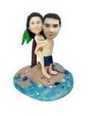 Couple bobblehead on the beach