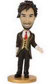 Male bobble head doll in suit