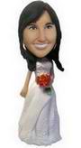 Girl bobblehead wearing a wedding dress