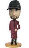 Serious man bobble head doll