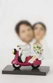 Wedding  bobble head doll witha red motorcycle