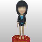 Casual young lady bobble head doll