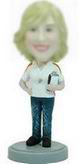 Female coach bobble head doll