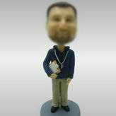 Coach man bobble head doll