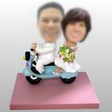 Couple bobble head doll On Scooter