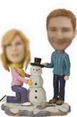 Couple bobble head doll with Snowman