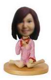 Women bobblehead with pink pajamas