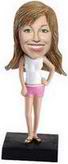 Female bobble head doll wearing slippers