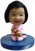 Little Girl bobblehead with Teddy Bear