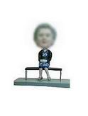 Female bobble head doll on the bench