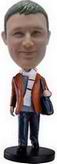 Man bobble head doll with White Scarf