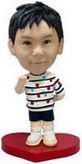 Boy bobble head doll On Heart