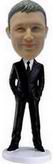 Boss bobblehead wearing a black suit