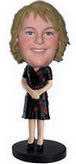 Female bobble head doll with  black skirt