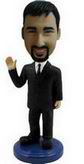 Man bobble head doll with black suit