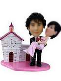 Wedding bobblehead - the groom holding the bride