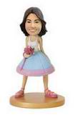 Women bobblehead with  white dress