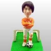 Football player bobble head doll