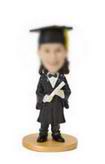 Bobble head doll with Black graduation clothing