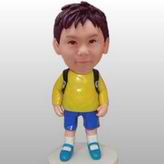 Little student boy bobble head doll