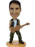 Guitarist bobble head doll