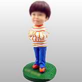 Little boy bobble head doll