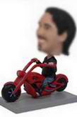 Sportsman bobblehead  on the red motorcycle