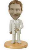 The groom  bobble head doll- a white tuxedo