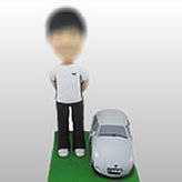 Men bobbl head doll with car