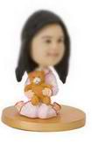 The little girl bobblehead  with Winnie