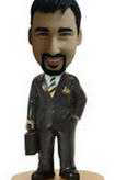 Male bobble head doll in suit with Briefcase