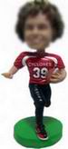 Male rugby player bobble head doll