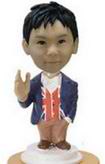 The little boy bobblehead say hello