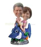 Personalized custom Couple riding a whale bobbleheads