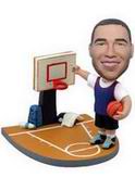 Male bobblehead with basketball court background