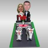 Ride the skin couple of carriage bobbleheads